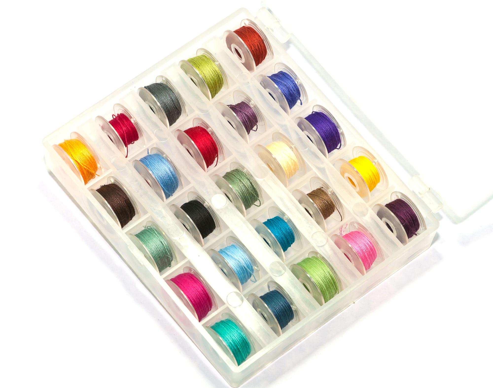 embroidery sample on linen with color swatches