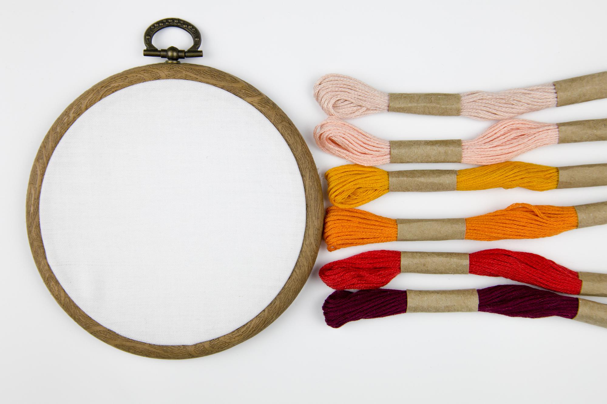 close-up embroidery hoop showing detailed stitches